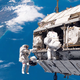 Astronauts doing some work on the outside of the ISS (Image: NASA)